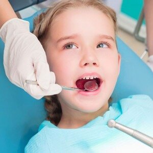 Girl in dentist chair