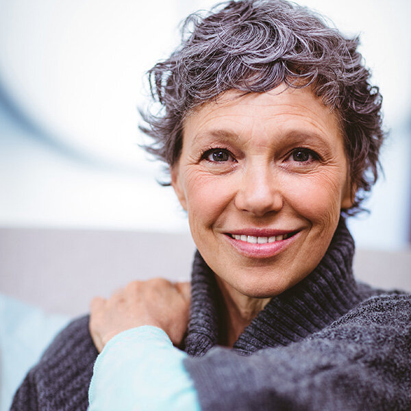 middle aged woman in sweater