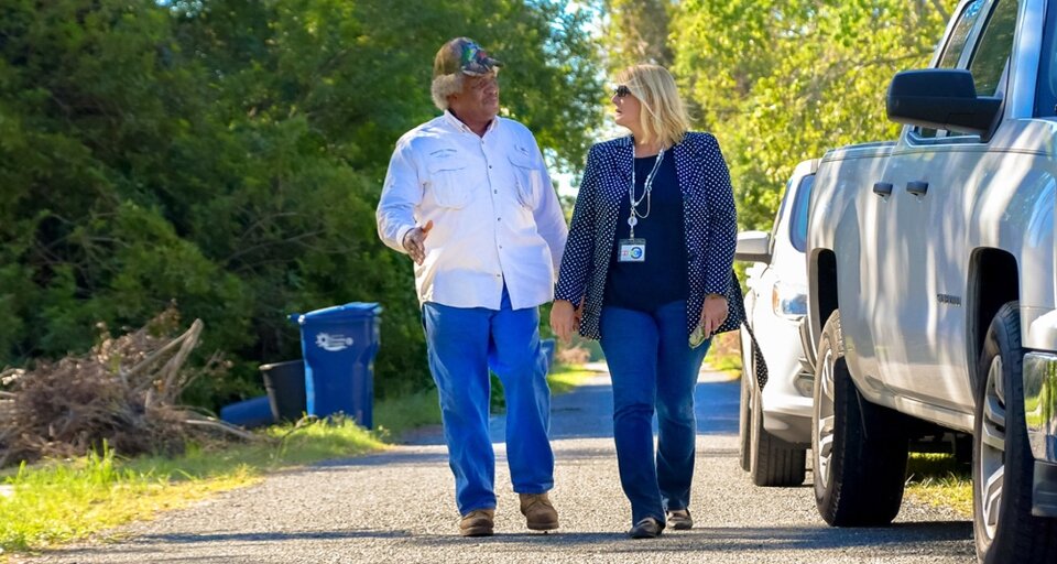 man and woman walking